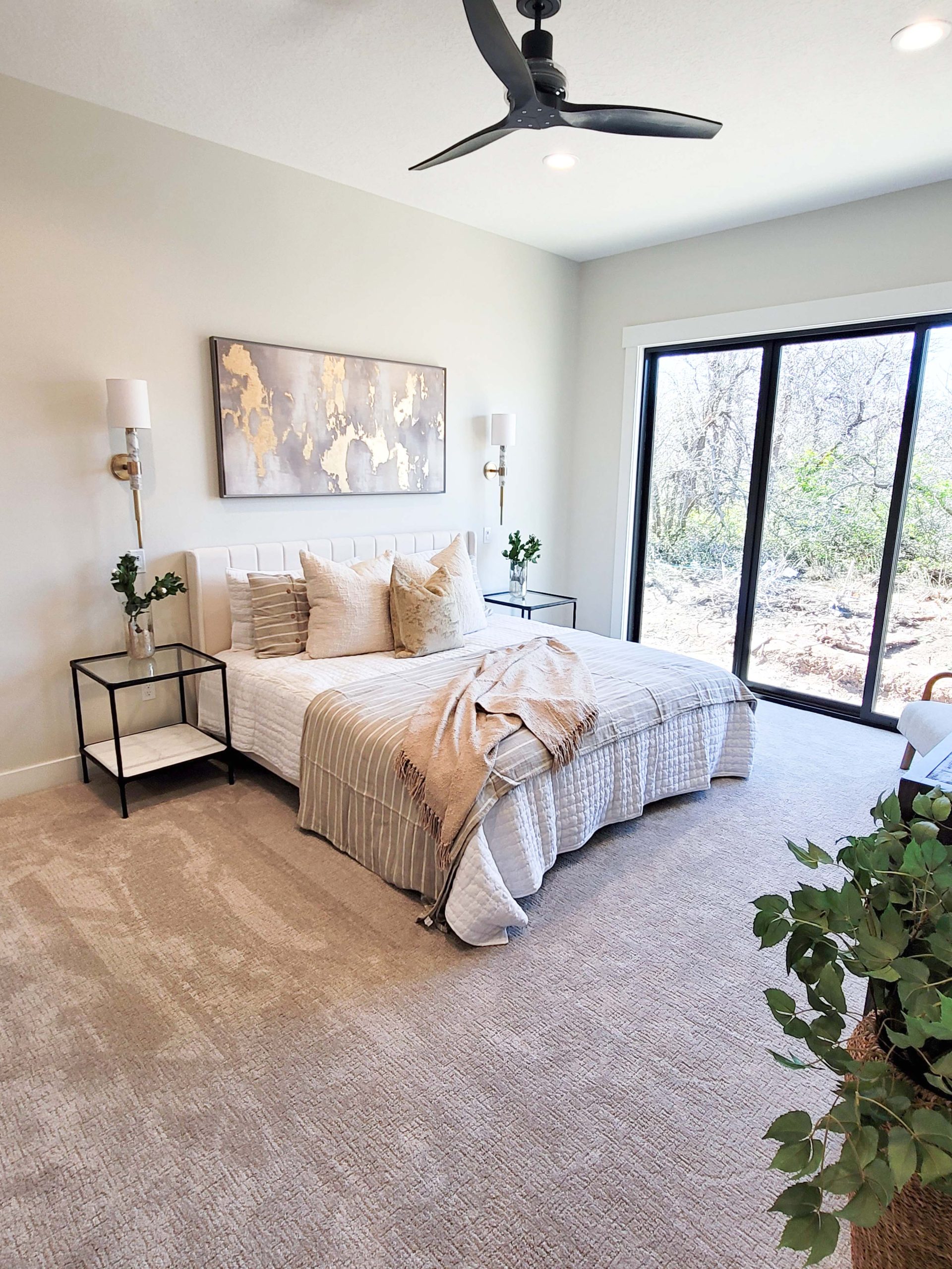 Neutral carpet flooring in a cozy bedroom interior